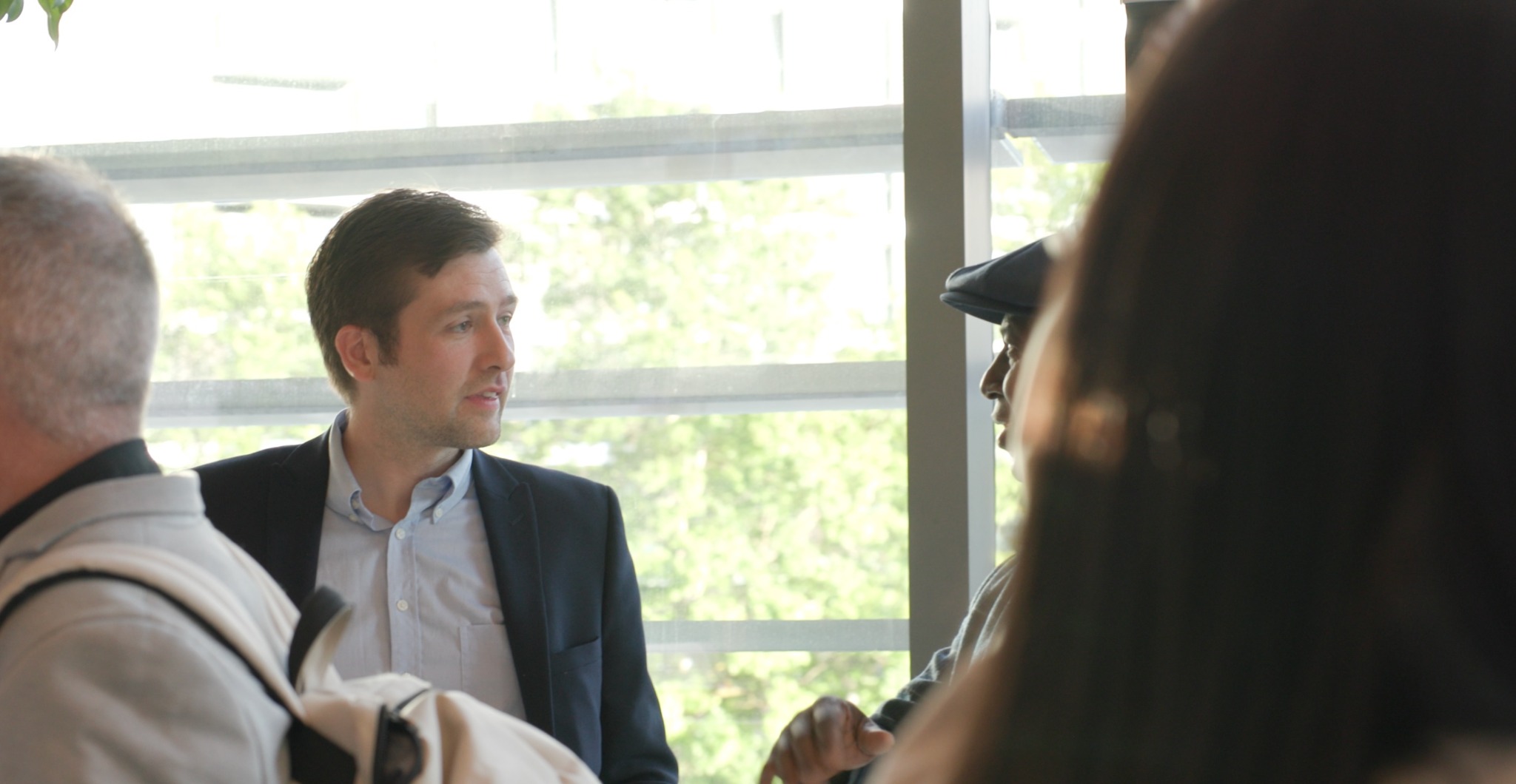 A member of the Swift team talking with property professionals